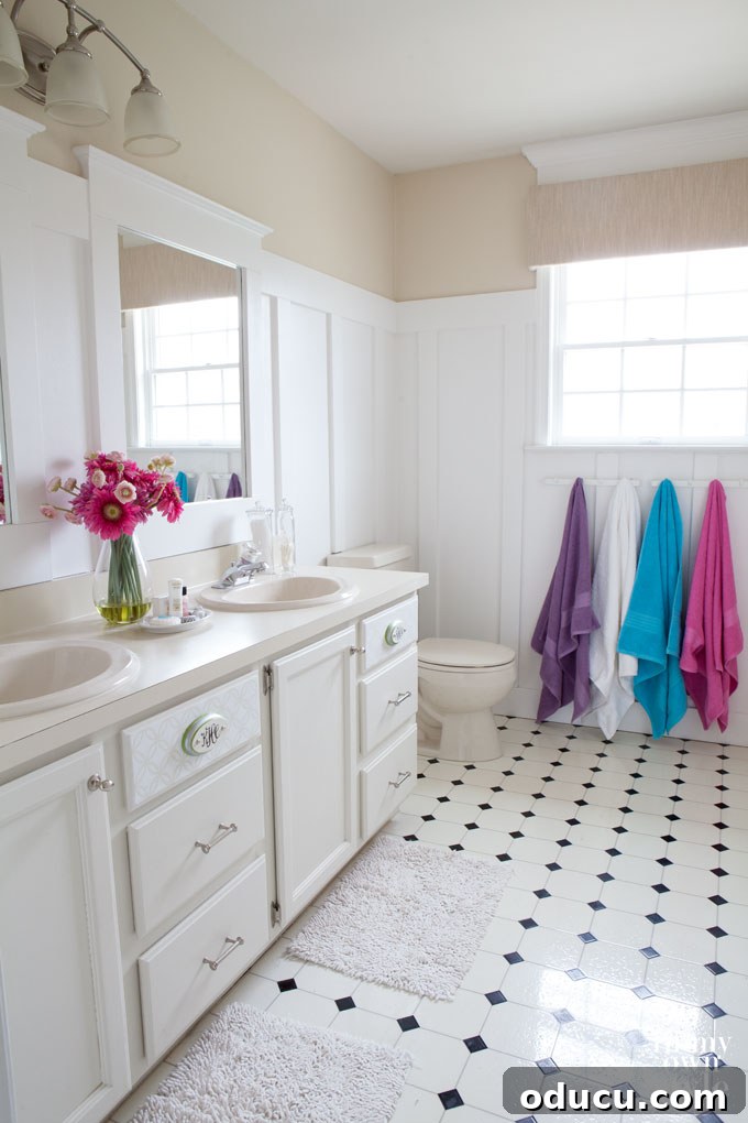 Beautifully stenciled and monogrammed bathroom cabinet drawer fronts for enhanced decor