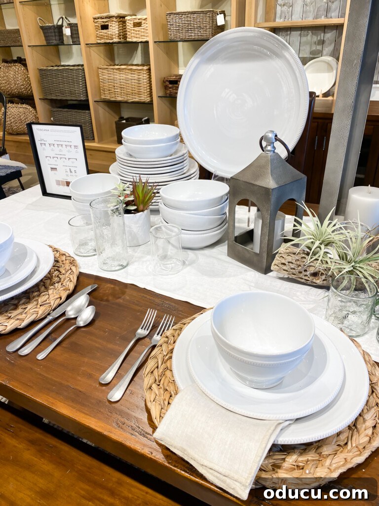 10 Easy DIY Decor Projects to Achieve a Designer Look for Less 11 White table place settings in wood table in Pottery Barn store.