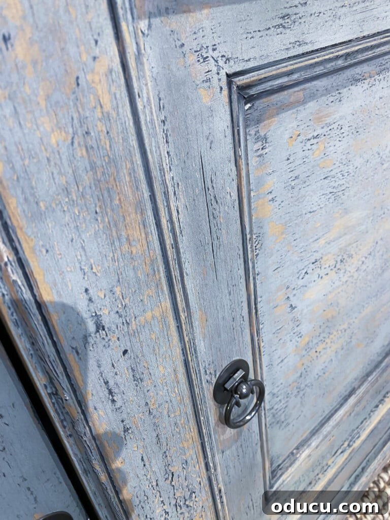 10 Easy DIY Decor Projects to Achieve a Designer Look for Less 7 blue aged painted finish on sideboard