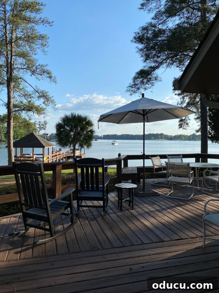 Style Odyssey: Chapter 89 2 Serene view of a tranquil lake from a wooden deck, bathed in morning light