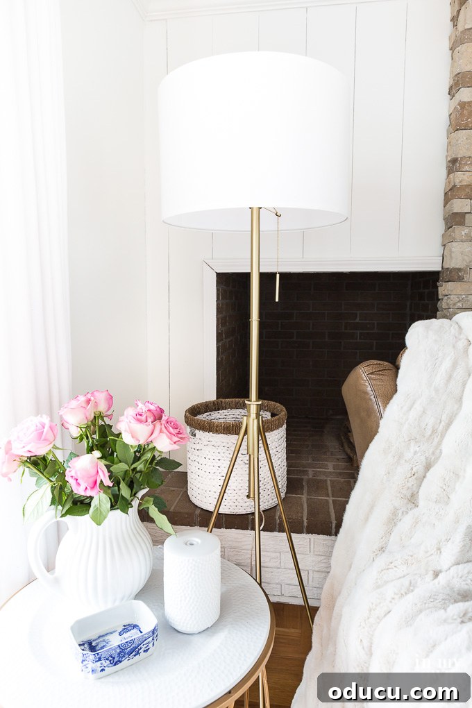 Stunning Floor Lamp Makeover for Less Than Ten Bucks 2 Brass floor lamp with white shade in living room