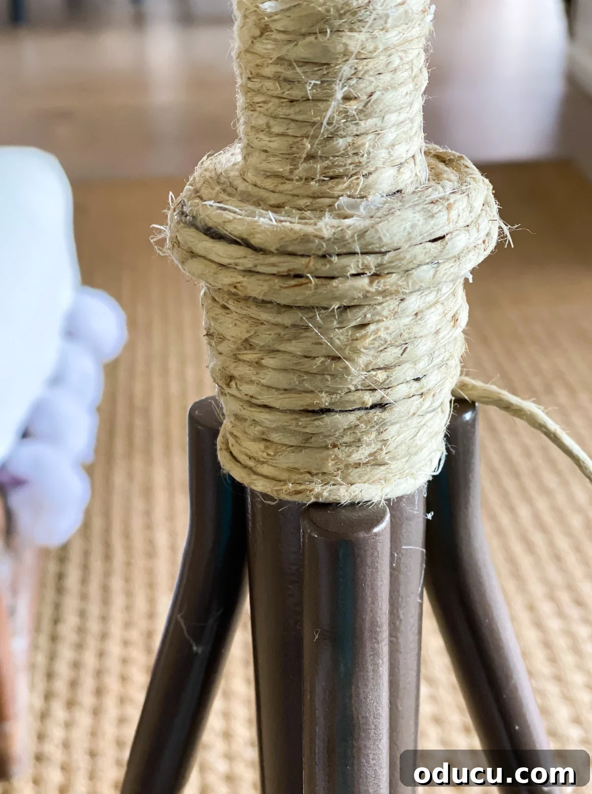 Stunning Floor Lamp Makeover for Less Than Ten Bucks 8 Wrapping twine around a tripod style floor lamp to give it a new look for summer.