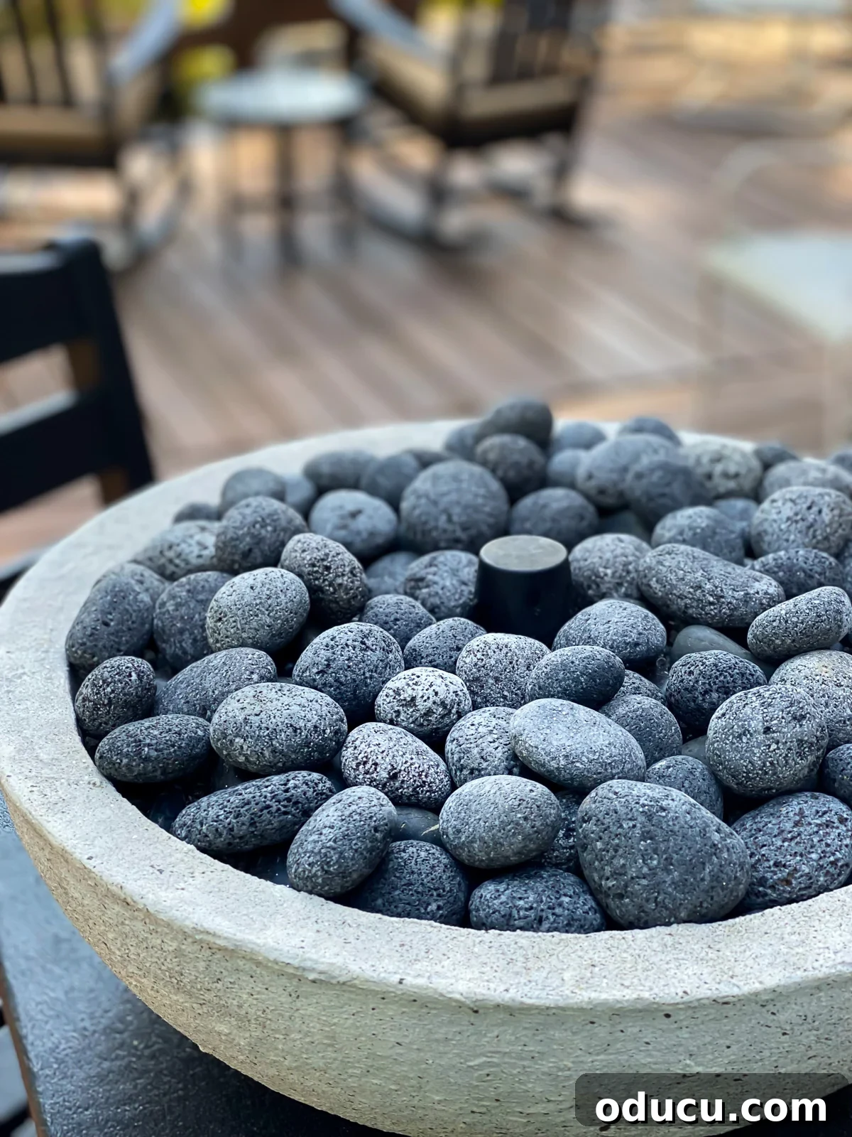 DIY tabletop fire bowl on table not in use. Cover is over wick.