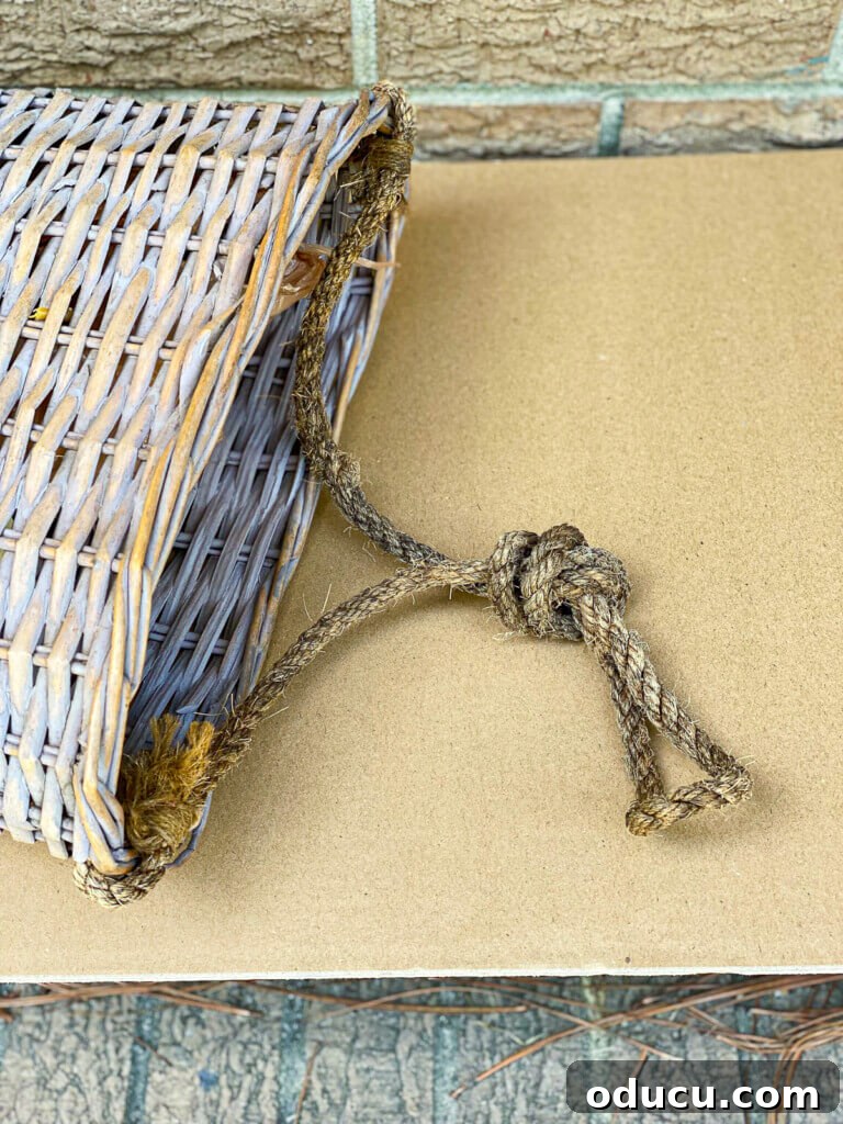 Cozy Fall Wicker Door Basket Project 9 A rope hanger on flat sided basket used for a door.