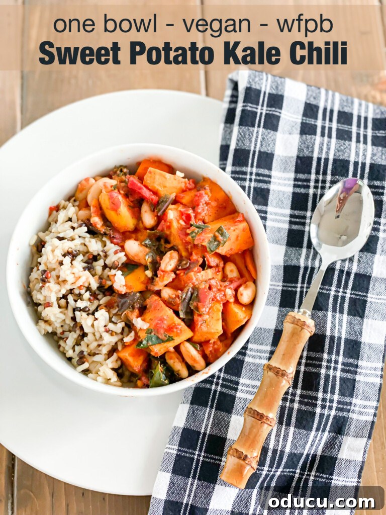 The Kale Chili You'll Make Again and Again 6 A beautifully presented bowl of kale chili with sweet potatoes and rice, ready to be enjoyed.
