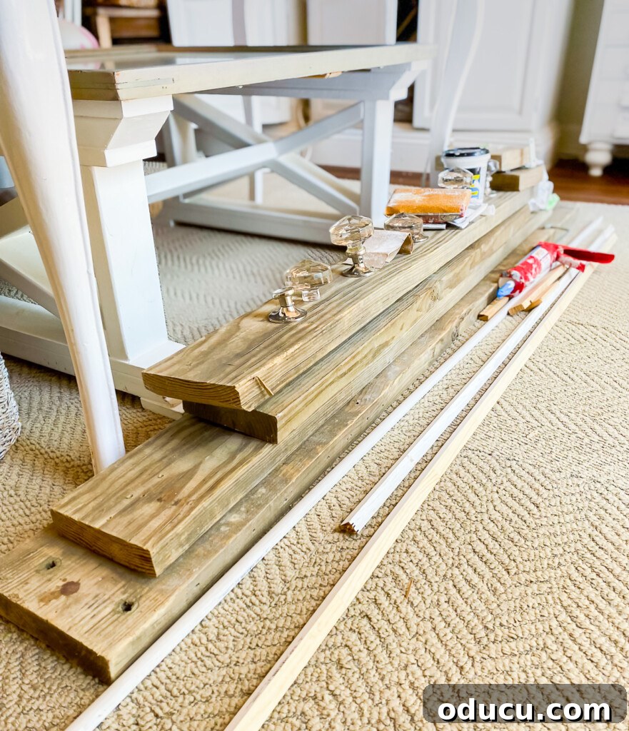 12 Affordable DIY Summer Decor Projects 25 Pieces of reclaimed wood, ready for incorporation into a living room design, suggesting rustic or industrial decor possibilities.
