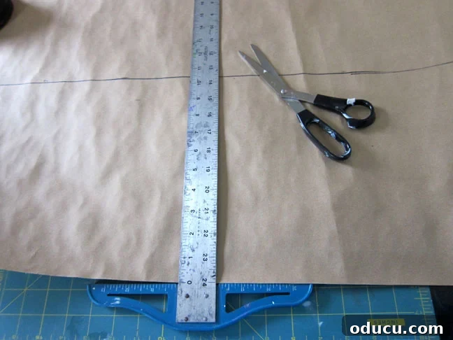 Create Your Own Pet Food Storage System 6 Demonstration of how to cover a tin with paper for DIY pet food storage