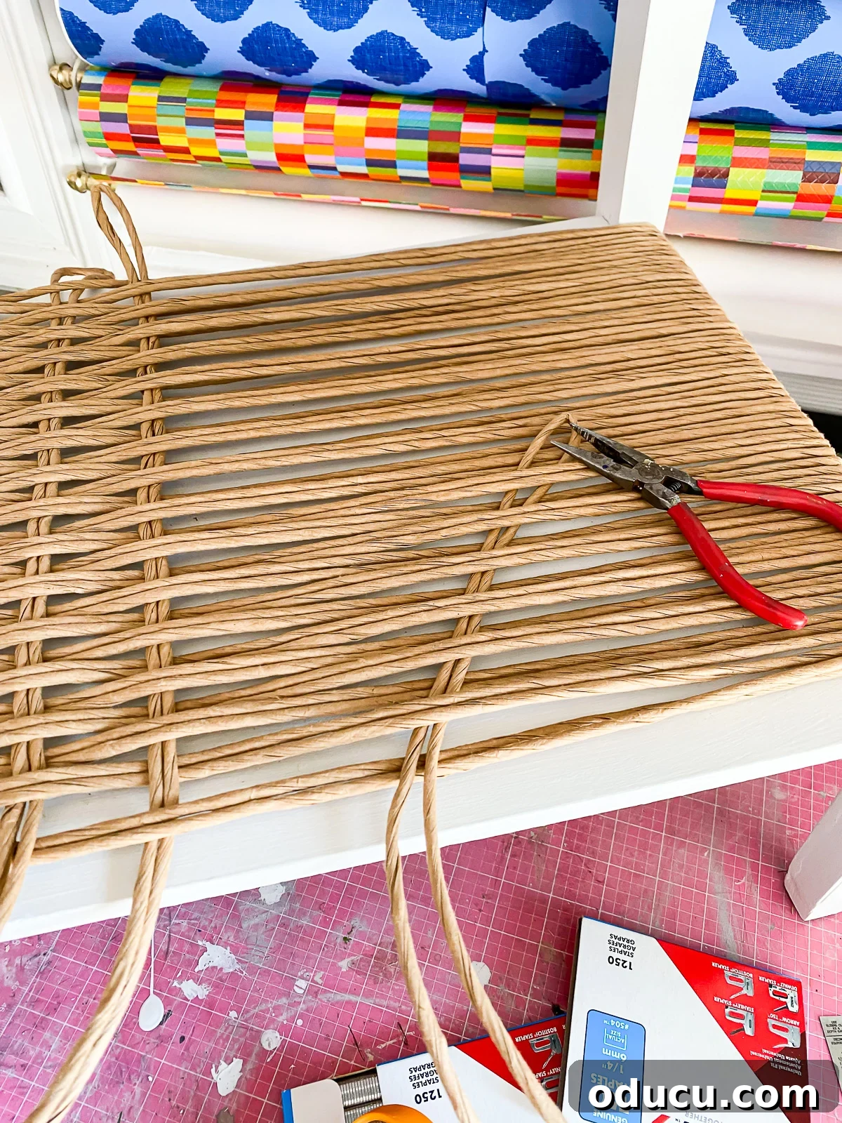 Designer Dupe Two-Tier End Table Makeover 22 A helpful tip for pulling fiber rush cord while weaving it onto a side table, especially when the tension gets tight.
