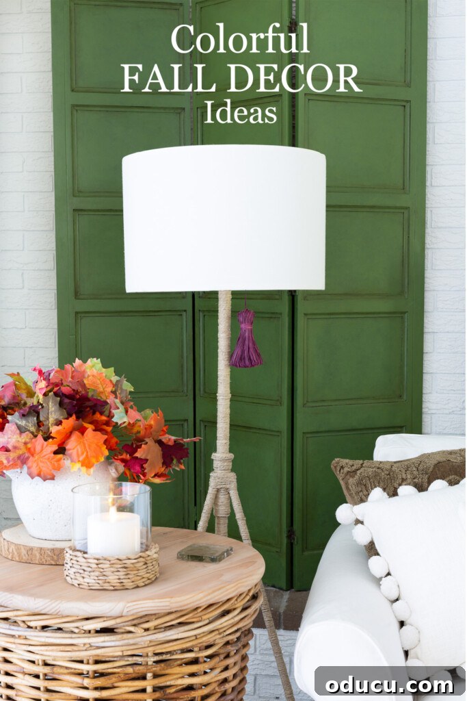 Embracing Autumn Hues in Your Living Space 17 Colorful fall decor ideas. Decorative green paneled screen with floor lamp in bright fall colors, inspiring budget-friendly autumn decor in a unique space.