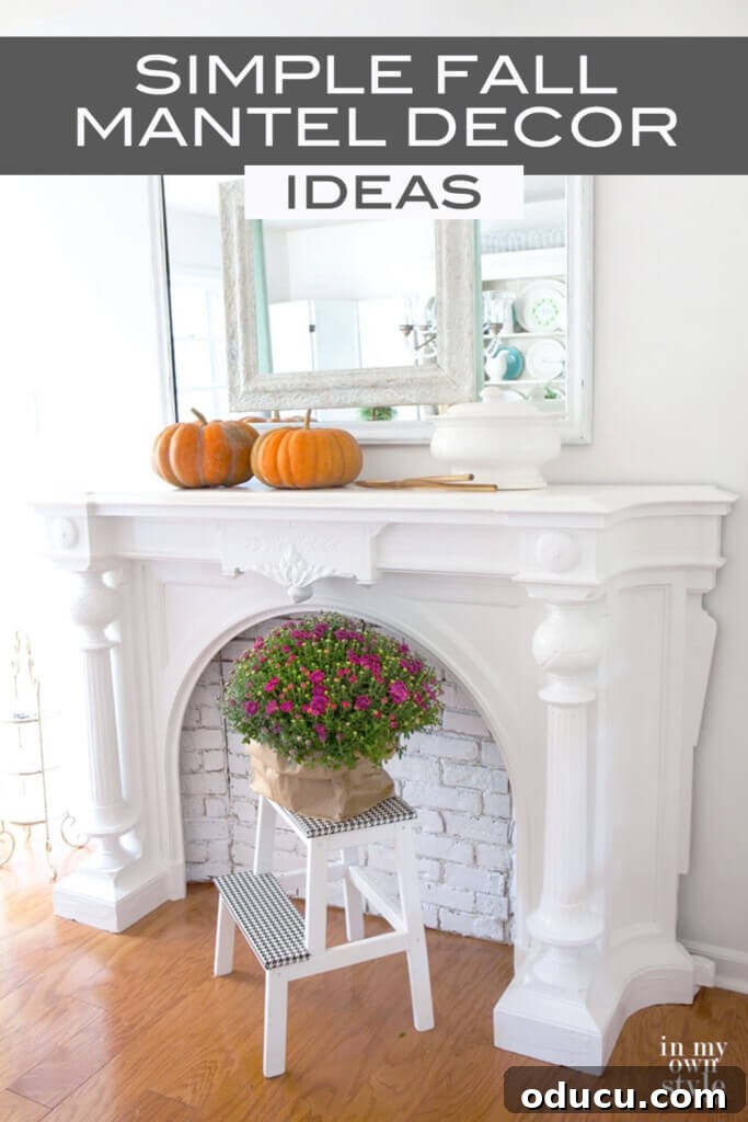 Harvest Mantel Pumpkin Charm 3 Beautifully decorated fall mantel featuring layered mirrors, an abundance of orange pumpkins, candles, and rustic elements