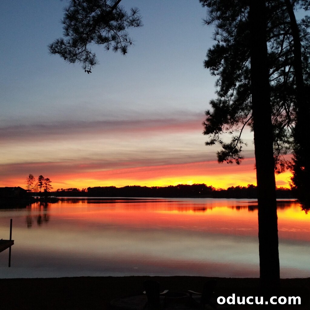 Cozy Fall Home Challenge 3 Stunning sunset casting warm colors over the tranquil waters of Lake Murray, reflecting the peaceful end of a day.