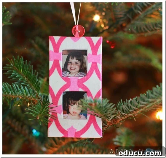 Craft 15 Beautiful Christmas Ornaments You'll Cherish 13 Two DIY fabric Christmas ornaments featuring cherished family photos.