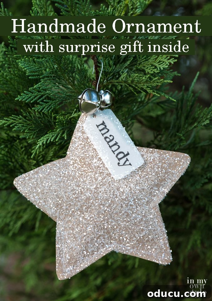 Craft 15 Beautiful Christmas Ornaments You'll Cherish 3 Handmade Christmas Star Ornament with a surprise gift hidden inside, hanging on a tree.