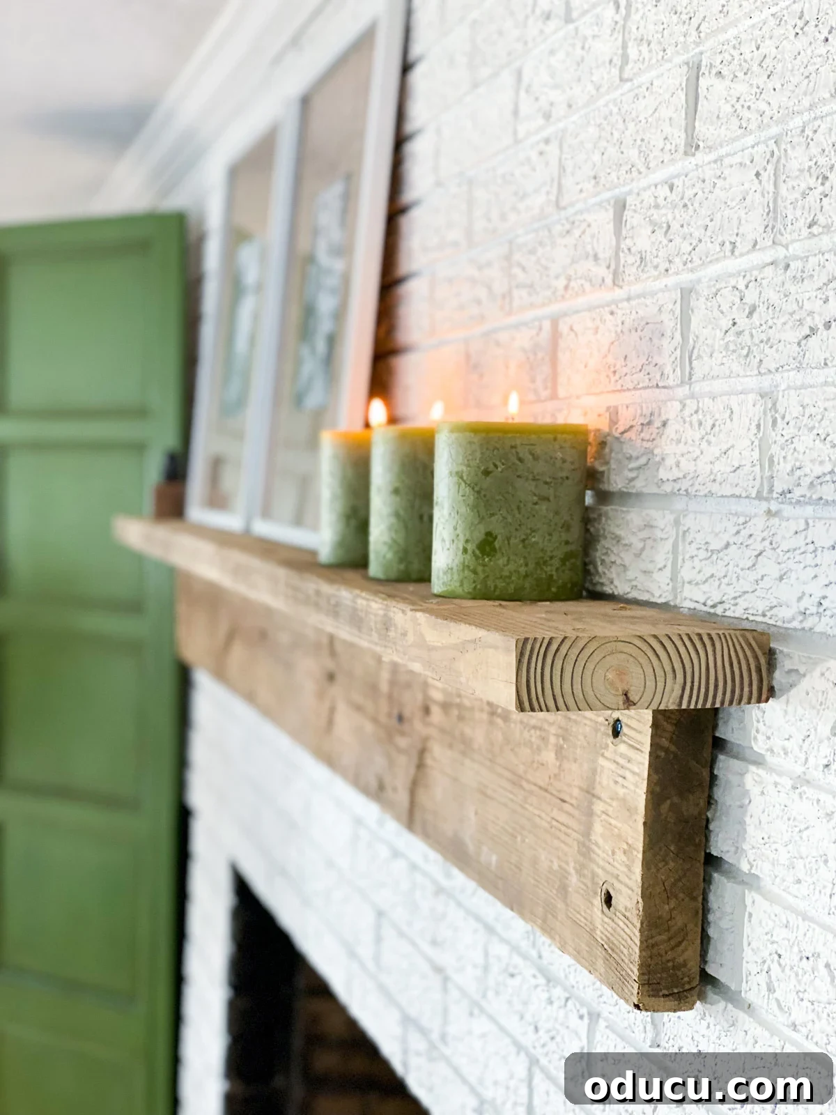 Easy to Build DIY Fireplace Mantel Shelf hung on brick wall.