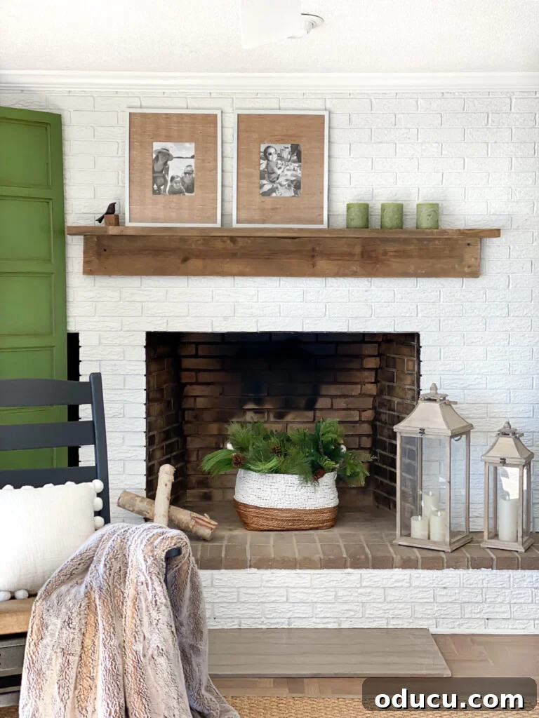 Effortless DIY Fireplace Mantel 8 Living room with white brick fireplace wall and reclaimed wood DIY mantel