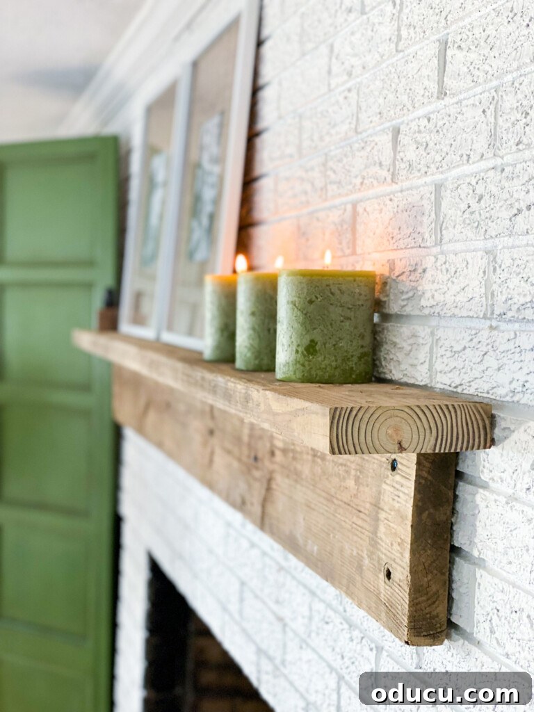 Effortless DIY Fireplace Mantel 9 Easy to Build DIY Fireplace Mantel Shelf hung on brick wall.