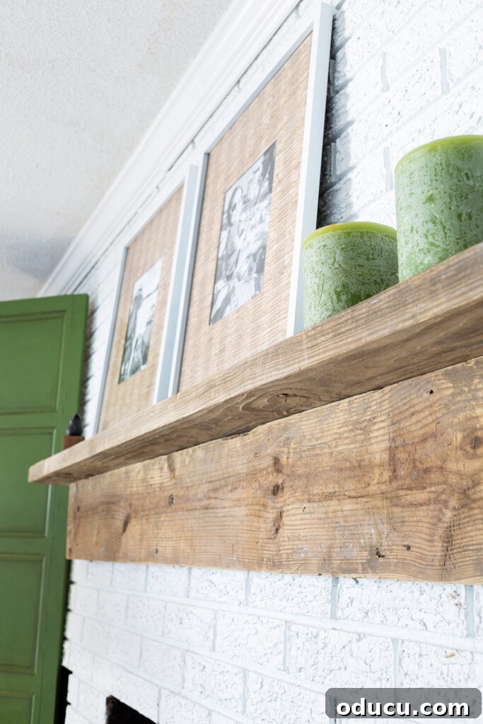 Effortless DIY Fireplace Mantel 10 looking up at newly built rustic wood fireplace mantel