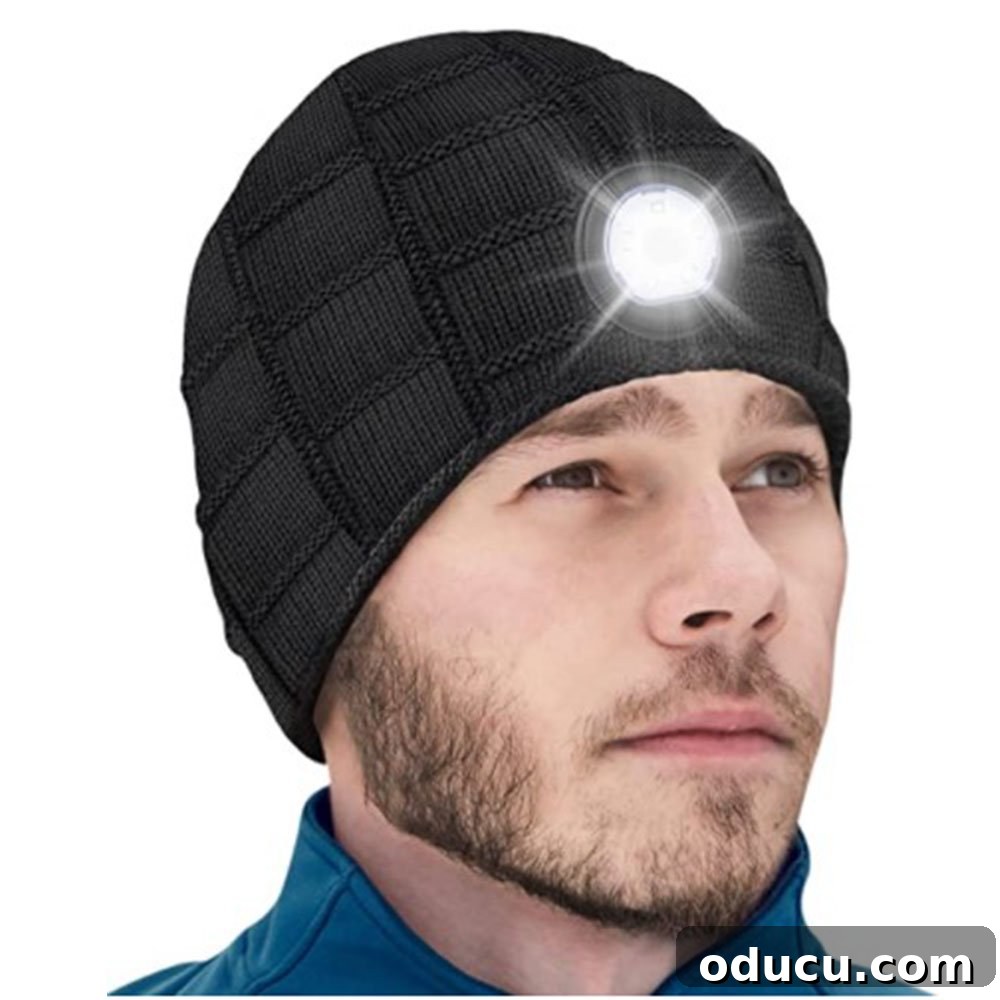 Gifts Guys Actually Want This Holiday 6 Men's beanie with an integrated LED light, ideal for hands-free illumination