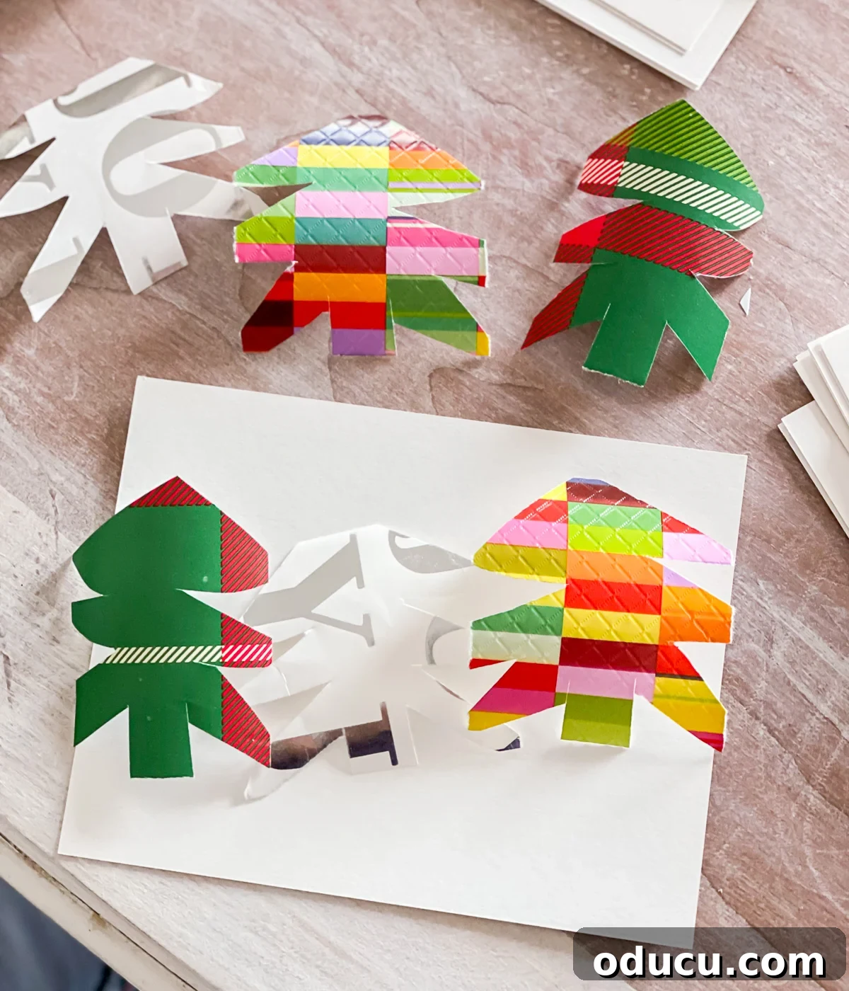 How to make simple Christmas cards using gift wrap.