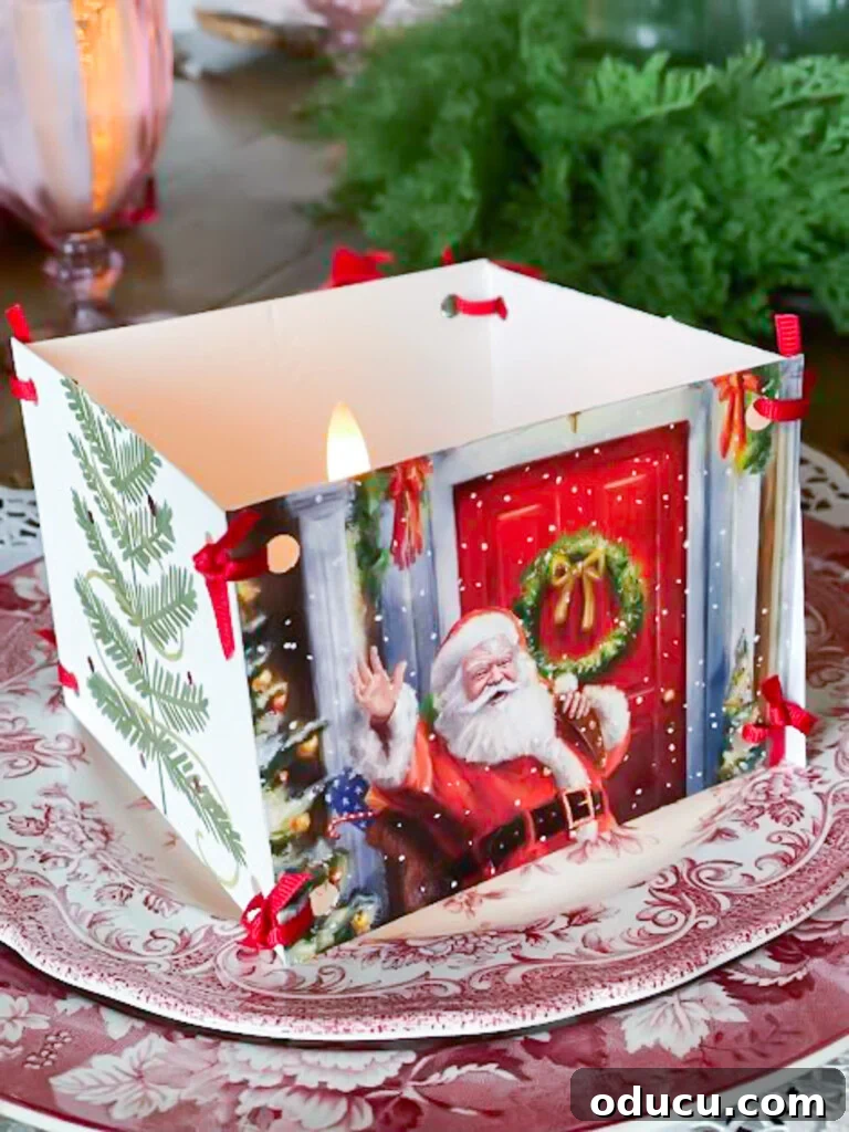 Repurpose Christmas cards into a decorative accent for a votive candle on a dinner table setting.