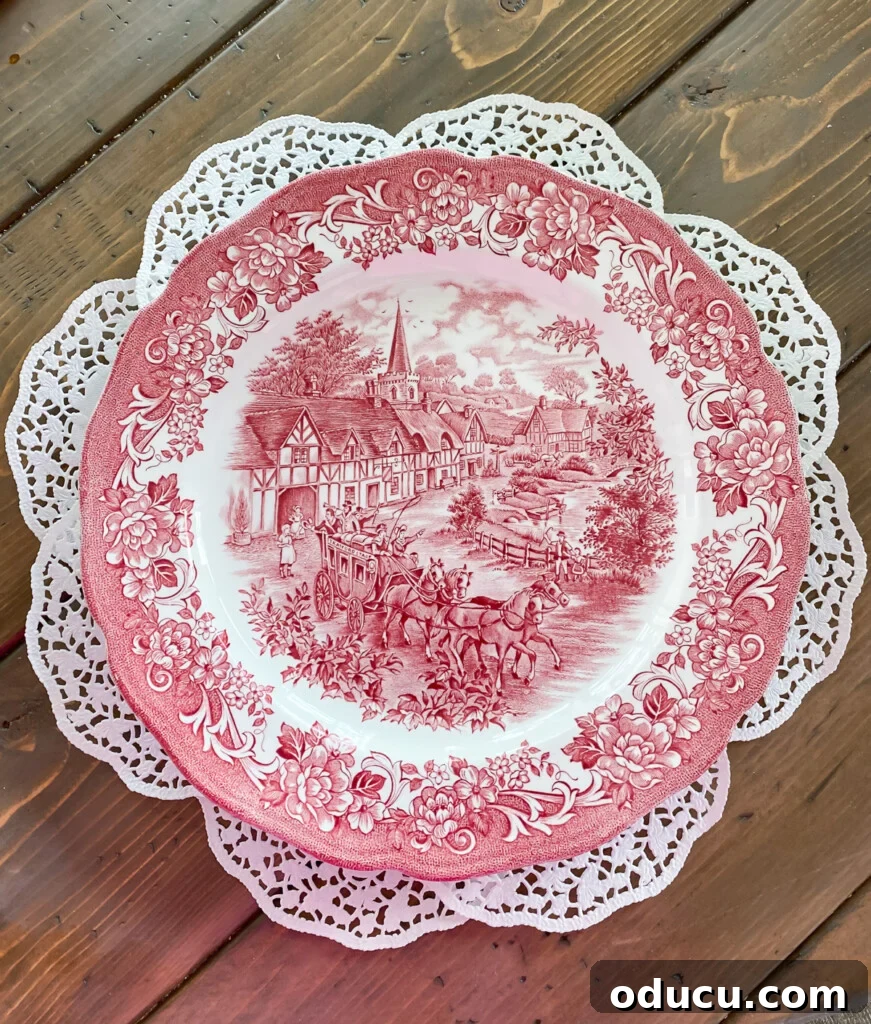 DIY Charming Paper Doily Placemats and Plate Chargers 4 Vintage red and white plate on DIY round paper doily placemat