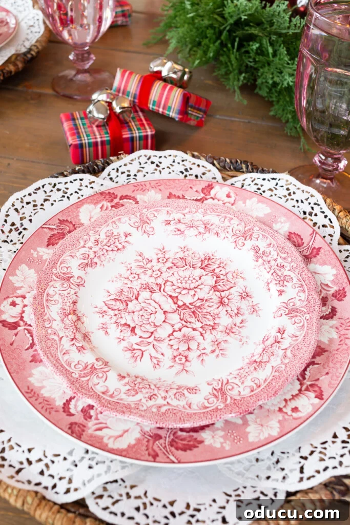 DIY Charming Paper Doily Placemats and Plate Chargers 9 Vintage red and white dinner plates on a round placemat made with paper doilies.