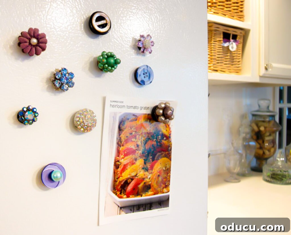 Repurpose Your Jewelry for Home Decor 8 A collection of old vintage clip-on earrings transformed into charming refrigerator magnets.