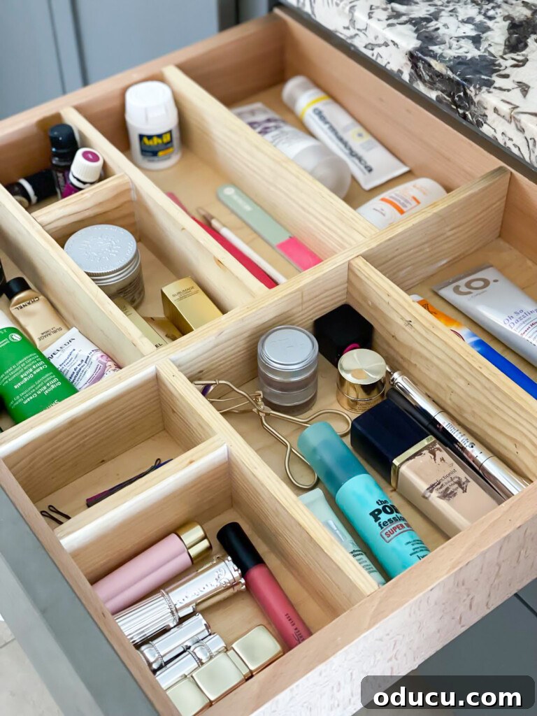Triple-Tier Revolving Bathroom Organizer 4 Bathroom drawer with DIY wood dividers to keep items organized