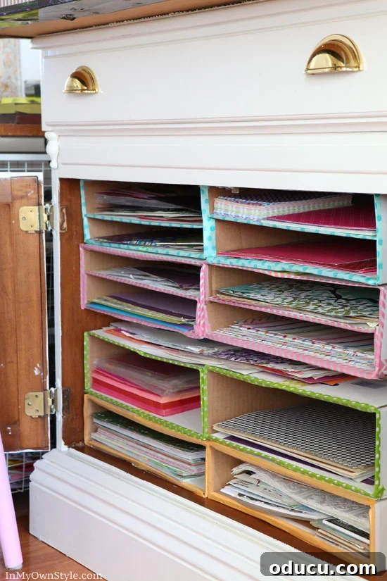 31 Clever & Chic Craft Room Ideas 26 Storage ideas for scrapbook paper using decorative pizza boxes stacked in a cabinet