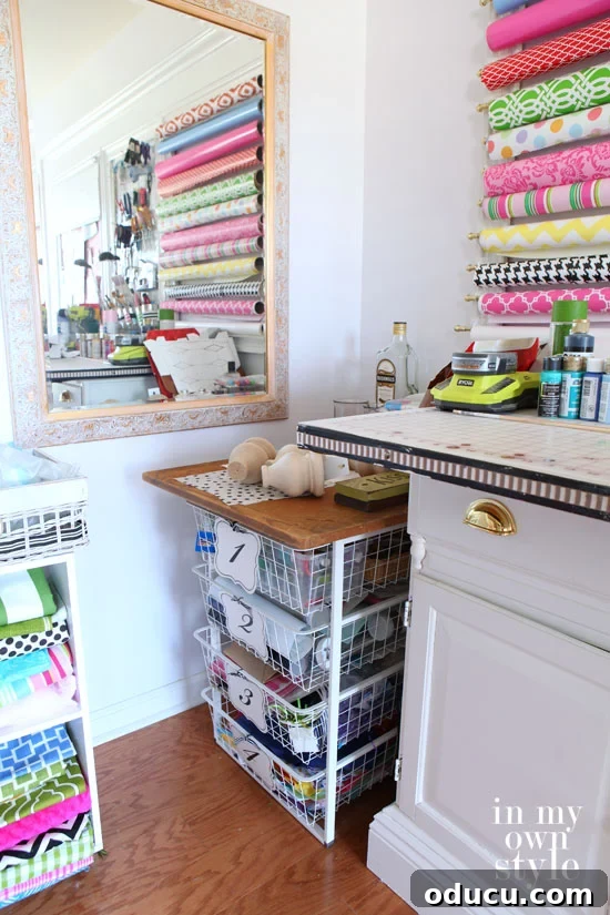31 Clever & Chic Craft Room Ideas 27 Blogger's craft room with IKEA stacking drawers, labeled for craft supplies