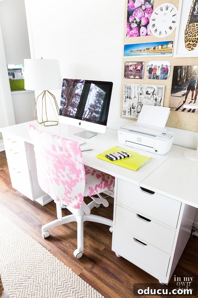 31 Clever & Chic Craft Room Ideas 32 Blogger's craft room with a comfortable chair, designed for extended crafting sessions