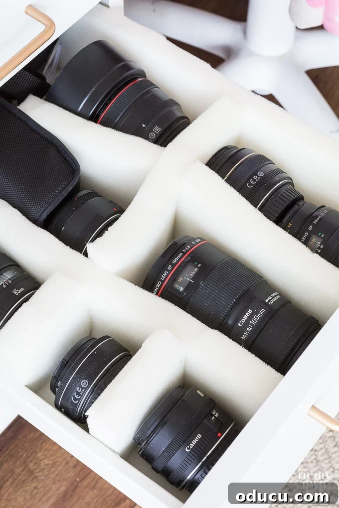 31 Clever & Chic Craft Room Ideas 39 How to safely store camera lenses in a drawer using repurposed foam dividers