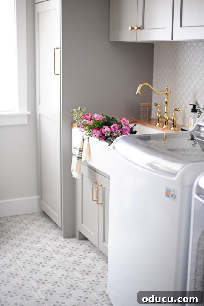 Style Dispatch 128 2 A beautifully organized and refreshed laundry room makeover from Pink Peppermint Designs, featuring elegant cabinetry and practical styling.