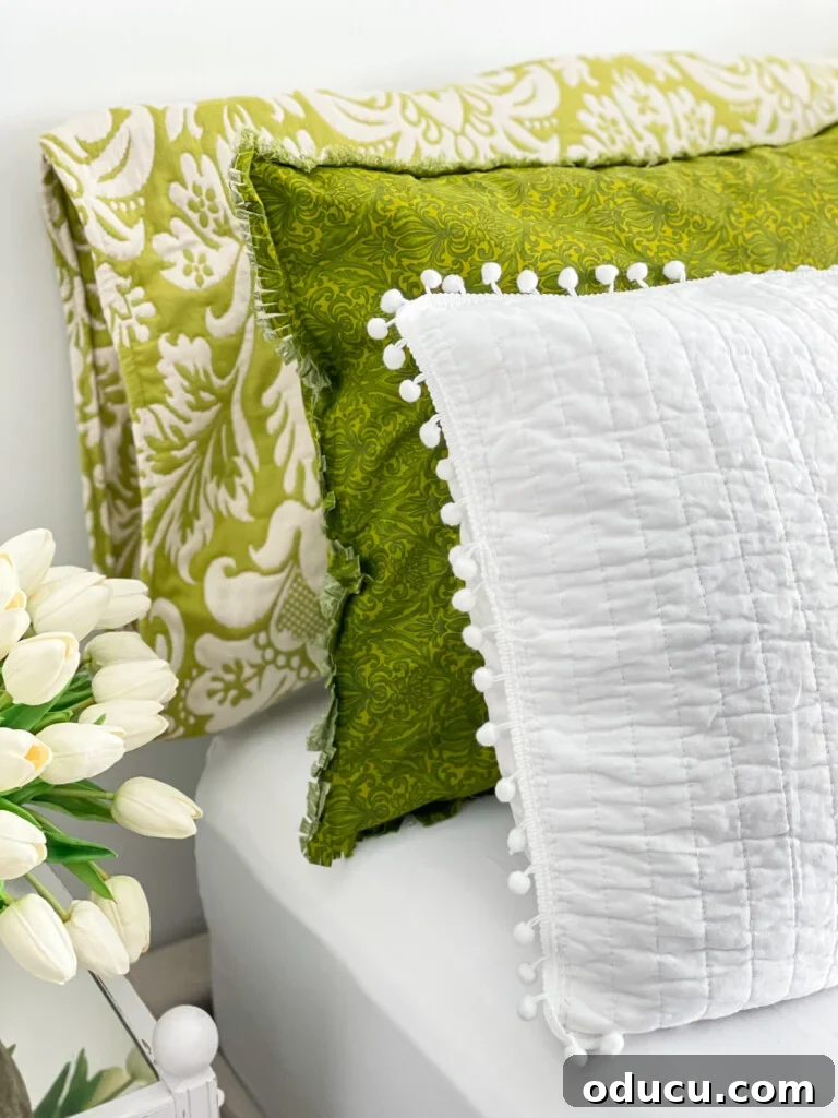 Christeli Charleston Mattress: What You Need to Know 16 3 green and white bed pillows on a bed