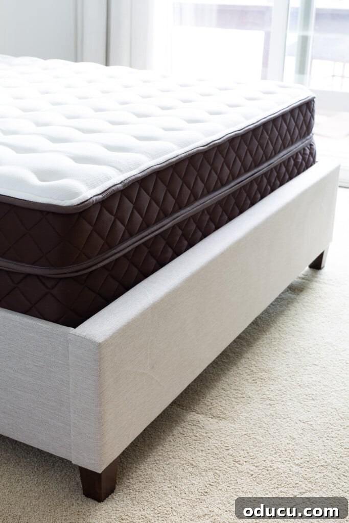 Christeli Charleston Mattress: What You Need to Know 8 Christeli Charleston 14.5 mattress and base in an Eastman upholstered platform bed frame.