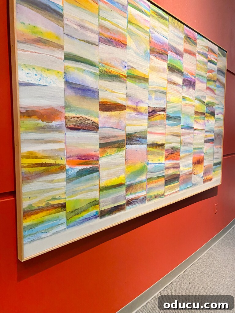 The Friday Connection 4 Vibrant modern art with a striking color mix on an orange wall, perfect for home decor inspiration.