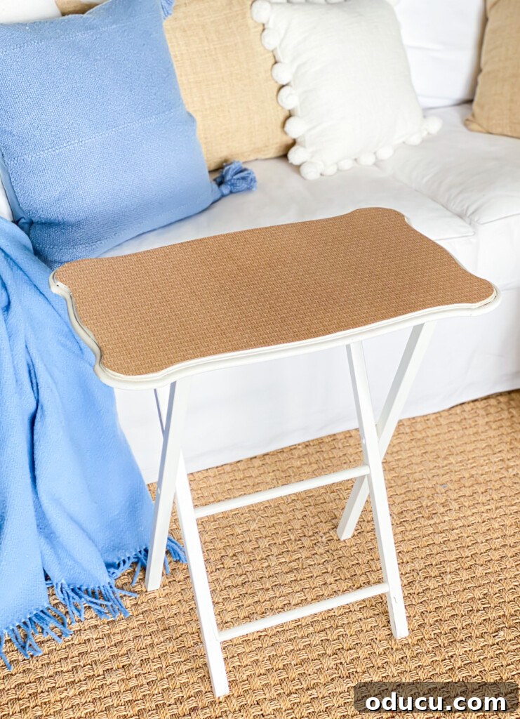 Decoupage Furniture Made Simple Your Visual Step by Step 18 A tray table with a top covered with wicker pattern wallpaper.