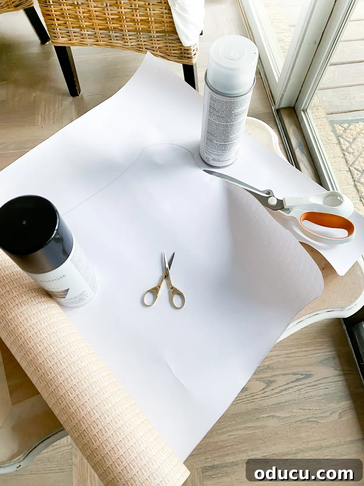 How to cut paper to the shape of the tray table top.