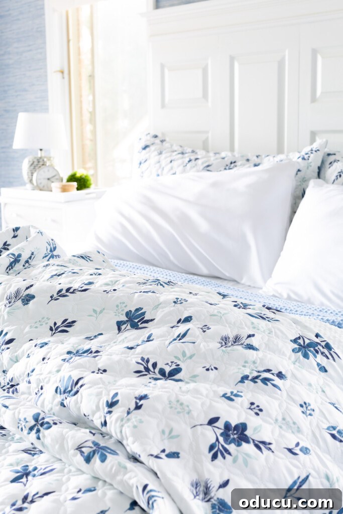 Bedroom Blooms: Your Instant Spring Refresh 4 Bedsure pillowcases and other bedding items arranged on a bed in a blue and white theme.