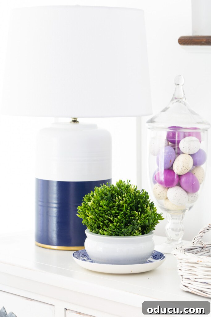 Pastel Easter Eggs in a Glass Canister blue, white and lavender decor on a table