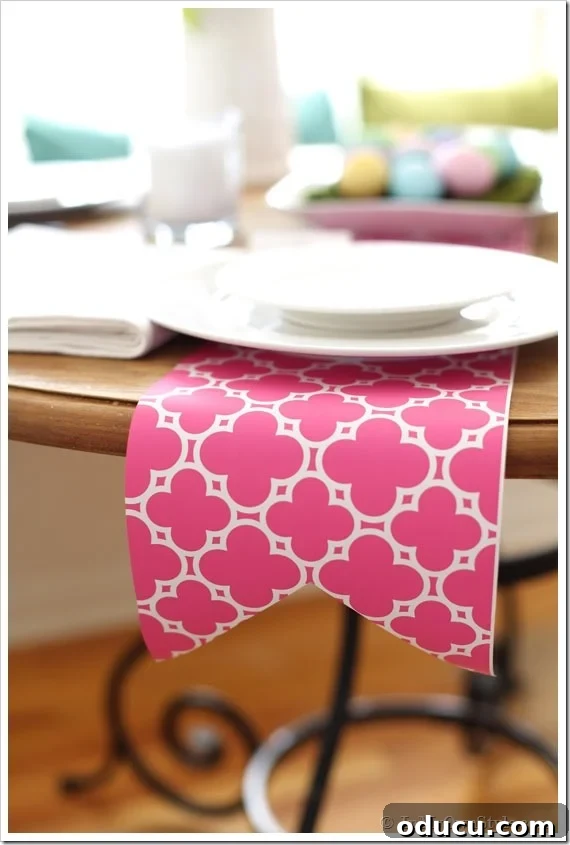 DIY Gift Wrap Table Runner for Easter pink and white gift wrap cut to make an Easter table dining table runner.