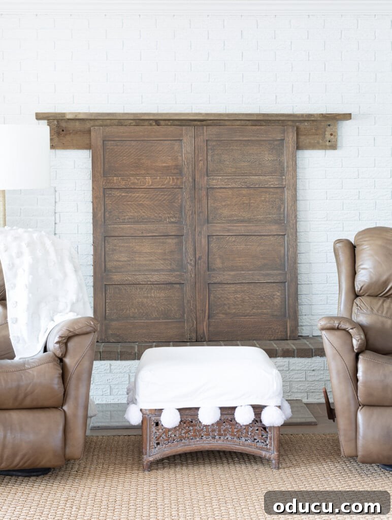 Found Treasure: My Living Room's Fireplace Cover 5 Elegantly repurposed wood panels from an old file cabinet now serve as a bespoke fireplace cover, blending seamlessly with the room's decor.