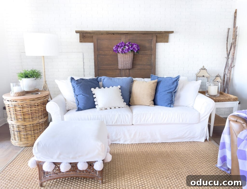 Instant Brick Wall: DIY with Faux Panels from Your Local Store 6 White and blue decorated living room for summer with a seamless white painted brick accent wall.