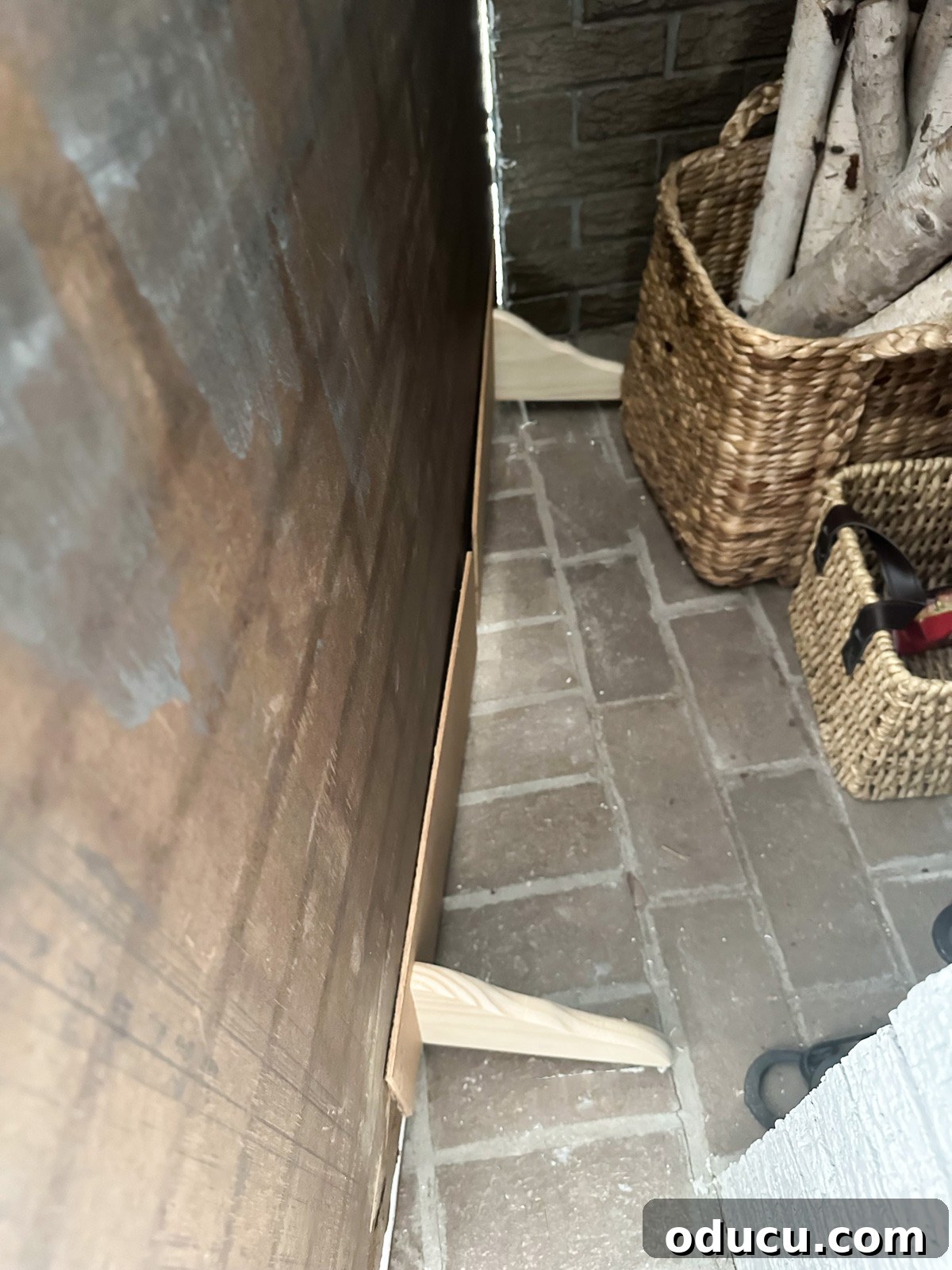 Instant Brick Wall: DIY with Faux Panels from Your Local Store 10 Wood brackets behind the brick panel to help keep it flat and in place against the wall.