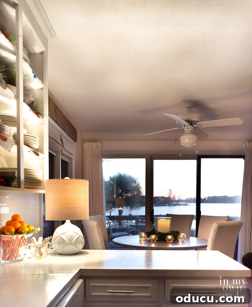 My Cozy Kitchen, Endless Culinary Horizons 7 Putting a lamp on a kitchen counter, showcasing cozy kitchen lighting ideas and how a kitchen peninsula connects to a dining area. Enhancing small kitchen ambiance.