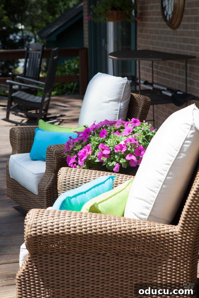 The Style Edit 146 2 Cozy outdoor living room with comfortable seating and greenery, ideal for relaxation and work