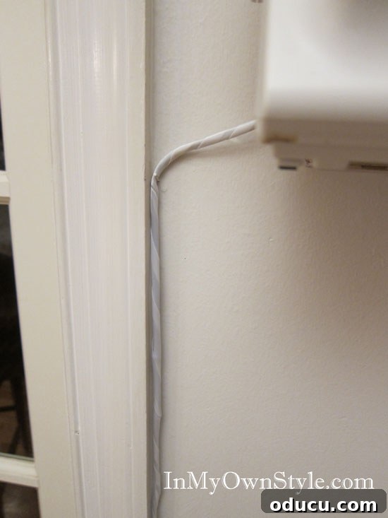 How to hide the wires on a landline telephone Step-by-step guide to securing a wrapped phone wire