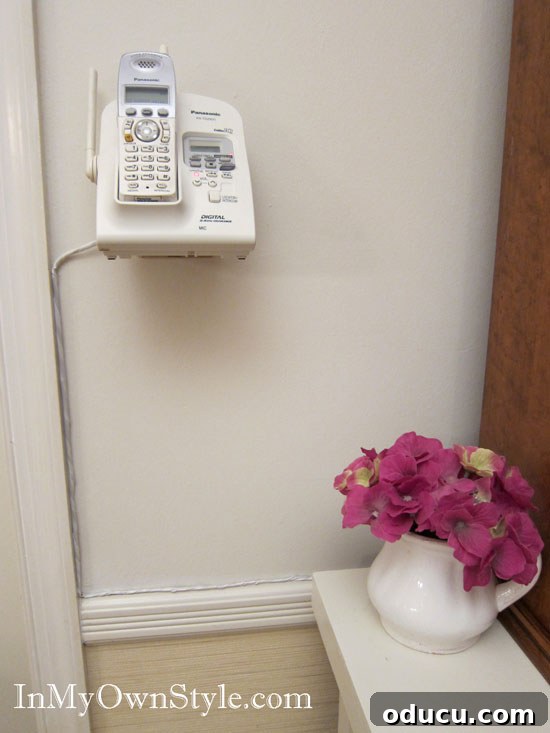 How to hide wires hanging from a wall Safely hidden telephone wires along wall molding