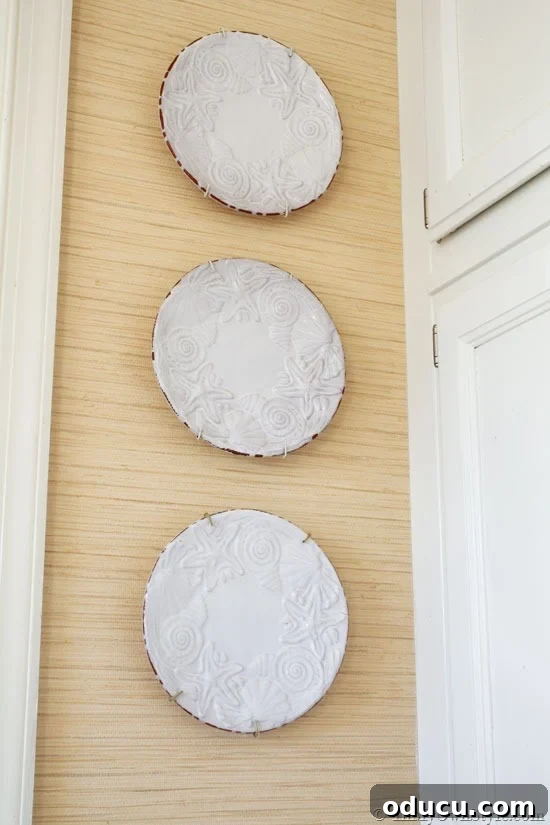 Playing With My Style 4 How to hang plates on a wall with paper clips - a budget DIY home decor idea