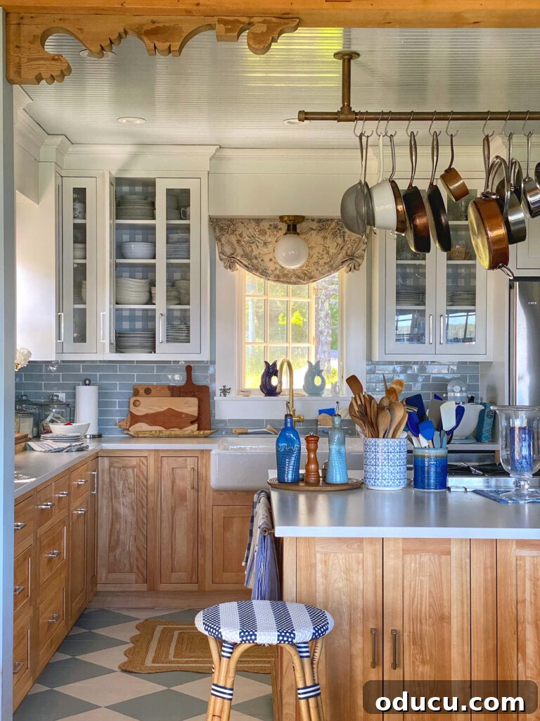 Fashion Finds 148 2 Molly in Maine kitchen with a painted checkerboard floor.